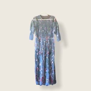 Sheer embroidered dress.